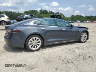 2016 Tesla Model S 90D with VIN 5YJSA1E27GF171605, listed as a Copart auction lot 59608645 with 90,080 mi miles and Salvage title. Bid and sale history available at DreamBid. Image 3.