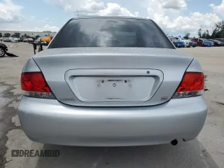 2006 Mitsubishi Lancer with VIN JA3AJ16E56U005818, listed as a Copart auction lot 60749615 with 155,194 mi miles and Salvage title. Bid and sale history available at DreamBid. Image 6.