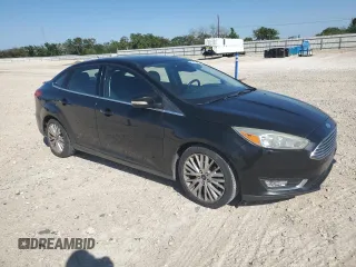 2015 Ford Focus Titanium with VIN 1FADP3J24FL305710, listed as a Copart auction lot 52413155 with 181,571 mi miles and Clean Title. Bid and sale history available at carsss.com. Image 4.