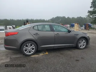 2013 Kia Optima EX z VIN 5XXGN4A70DG207530, wystawiony jako Copart lot #58270795 z przebiegiem 188 998 mil mil oraz Szkoda całkowita • Salvage title. Historia ofert i sprzedaży dostępna na DreamBid. Obrazek 3.