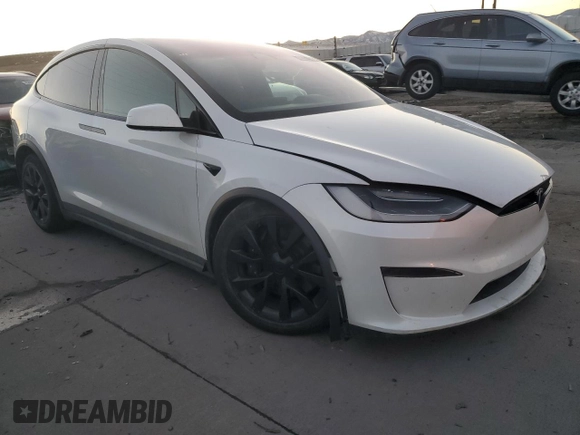 2022 Tesla Model X Plaid with VIN 7SAXCBE67NF356567, listed as a Copart auction lot 43243895 with 24,381 mi miles and Salvage Title. Bid and sale history available at DreamBid. Image 4.