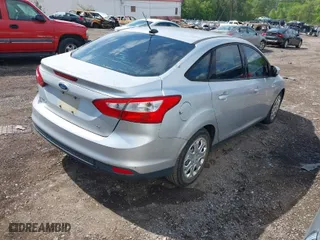 2012 Ford Focus SE with VIN 1FAHP3F22CL115877, listed as a IAAI auction lot 42031223 with 138,743 mi miles. Bid and sale history available at carsss.com. Image 4.