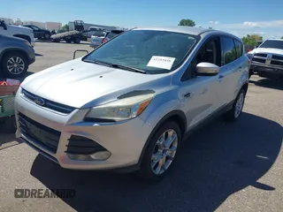 2013 Ford Escape SEL with VIN 1FMCU9HX0DUD42081, listed as a IAAI auction lot 42293456 with 100,013 mi miles and . Bid and sale history available at DreamBid. Image 2.