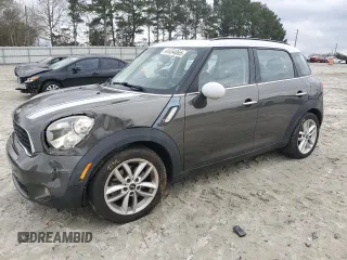 2014 MINI Countryman S with VIN WMWZC3C53EWT00673, listed as a Copart auction lot 44454065 with 76,561 mi miles and Salvage Title. Bid and sale history available at DreamBid. Image 1.