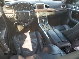 2012 Lincoln MKS with VIN 1LNHL9DR1CG805164, listed as a Copart auction lot 48375595 with 104,246 mi miles and Salvage Title. Bid and sale history available at carsss.com. Image 8.