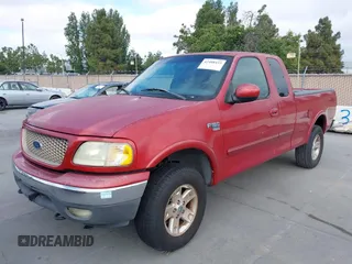 2002 Ford F-150 XL z VIN 1FTRX18W92KE21921, wystawiony jako IAAI lot #42488433 z przebiegiem 151 746 mil mil oraz . Historia ofert i sprzedaży dostępna na DreamBid. Obrazek 6.