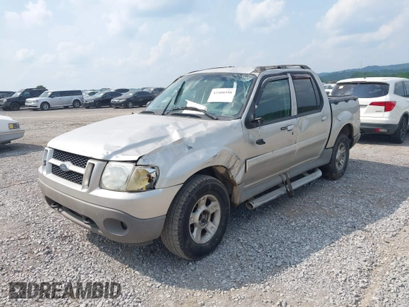 2003 Ford Explorer Sport Trac XLS z VIN 1FMZU77E73UB97392, wystawiony jako IAAI lot #42400398 z przebiegiem 160 556 mil mil oraz . Historia ofert i sprzedaży dostępna na DreamBid. Obrazek 2.