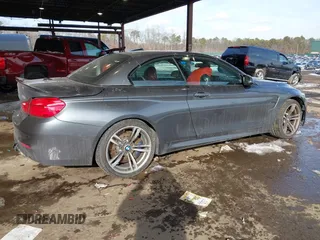 2017 BMW M4 with VIN WBS3U9C55HP970922, listed as a IAAI auction lot 41405271 with 61,953 mi miles. Bid and sale history available at carsss.com. Image 4.