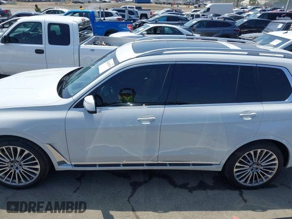 2019 BMW X7 xDrive50i z VIN 5UXCX4C54KLS38649, wystawiony jako IAAI lot #42435379 z przebiegiem 60 905 mil mil oraz . Historia ofert i sprzedaży dostępna na DreamBid. Obrazek 14.