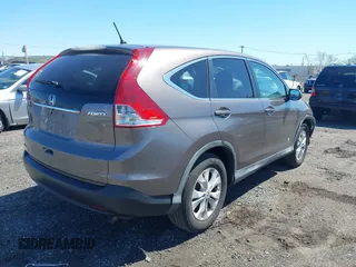 2014 Honda CR-V EX with VIN 2HKRM4H50EH628721, listed as a IAAI auction lot 42064143 with 103,009 mi miles and . Bid and sale history available at carsss.com. Image 4.