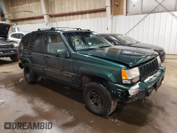 1997 Jeep Grand Cherokee Limited with VIN 1J4GZ78Y3VC733618, listed as a Copart auction lot 53757095 with 150,806 mi miles and Salvage title. Bid and sale history available at DreamBid. Image 4.