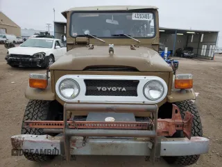 1977 Toyota Land Cruiser z VIN FJ40249180, wystawiony jako Copart lot #43203465 z przebiegiem 180 762 mil mil oraz Czysty tytuł • Clean title. Historia ofert i sprzedaży dostępna na DreamBid. Obrazek 5.
