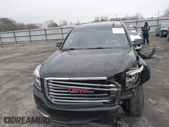2016 GMC Yukon SLT with VIN 1GKS1BKC9GR480199, listed as a IAAI auction lot 41352032 with 146,716 mi miles. Bid and sale history available at carsss.com. Image 12.