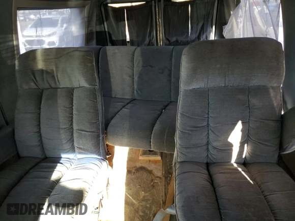1988 Ford Econoline Cargo with VIN 1FDEE14H0JHC01117, listed as a Copart auction lot 84187634 with 74,931 mi miles and Clean Title. Bid and sale history available at DreamBid. Image 10.