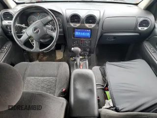 2005 GMC Envoy SLT with VIN 1GKDT13S452324077, listed as a Copart auction lot 57836195 with 299,146 mi miles and Clean title. Bid and sale history available at DreamBid. Image 8.