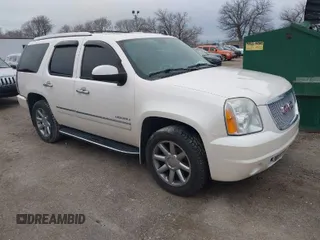 2012 GMC Yukon Denali with VIN 1GKS2EEFXCR312828, listed as a IAAI auction lot 41211753 with 192,461 mi miles. Bid and sale history available at carsss.com. Image 1.