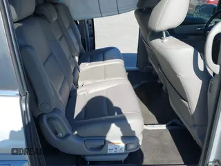 2014 Honda Odyssey EX-L with VIN 5FNRL5H63EB041106, listed as a IAAI auction lot 42294113 with 122,610 mi miles and . Bid and sale history available at DreamBid. Image 8.
