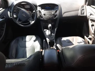 2015 Ford Focus SE z VIN 1FADP3F24FL314108, wystawiony jako Copart lot #57746805 z przebiegiem 64 659 mil mil oraz Szkoda całkowita • Salvage title. Historia ofert i sprzedaży dostępna na DreamBid. Obrazek 8.