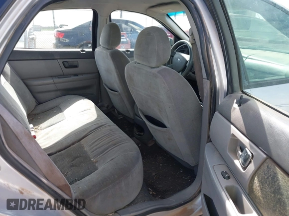 2006 Ford Taurus SE z VIN 1FAFP53U26A234490, wystawiony jako IAAI lot #42125983 z przebiegiem 173 686 mil mil oraz . Historia ofert i sprzedaży dostępna na DreamBid. Obrazek 8.