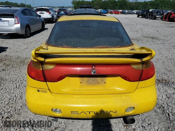2001 Saturn SC z VIN 1G8ZR12781Z311096, wystawiony jako Copart lot #60574014 z przebiegiem Nie podano mil oraz Tytuł czysty. Historia ofert i sprzedaży dostępna na DreamBid. Obrazek 6.