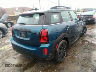 2022 MINI Countryman Cooper S with VIN WMZ83BR06N3N39575, listed as a IAAI auction lot 41477701 with 33,435 mi miles and . Bid and sale history available at DreamBid. Image 4.