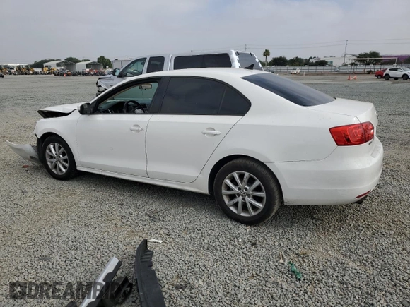 2012 Volkswagen Jetta SE with VIN 3VWDP7AJ9CM364672, listed as a Copart auction lot 61309775 with 124,965 mi miles and Salvage title. Bid and sale history available at DreamBid. Image 2.