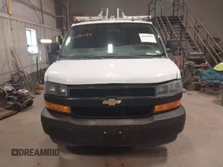 2018 Chevrolet Express Cargo with VIN 1GCWGAFP4J1342434, listed as a IAAI auction lot 42018086 with 149,934 mi miles and . Bid and sale history available at DreamBid. Image 12.