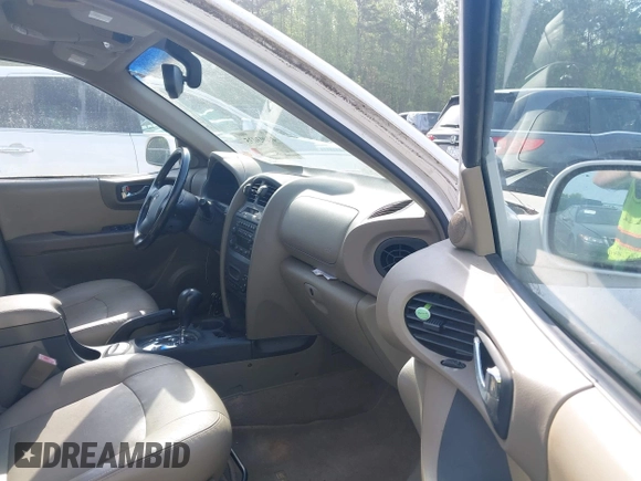 2005 Hyundai Santa Fe GLS with VIN KM8SC73E15U956552, listed as a IAAI auction lot 42003035 with 143,268 mi miles. Bid and sale history available at carsss.com. Image 5.