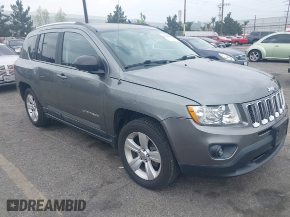 2011 Jeep Compass with VIN 1J4NF1FB7BD244088, listed as a IAAI auction lot 41889165 with 93,576 mi miles. Bid and sale history available at carsss.com. Image 1.
