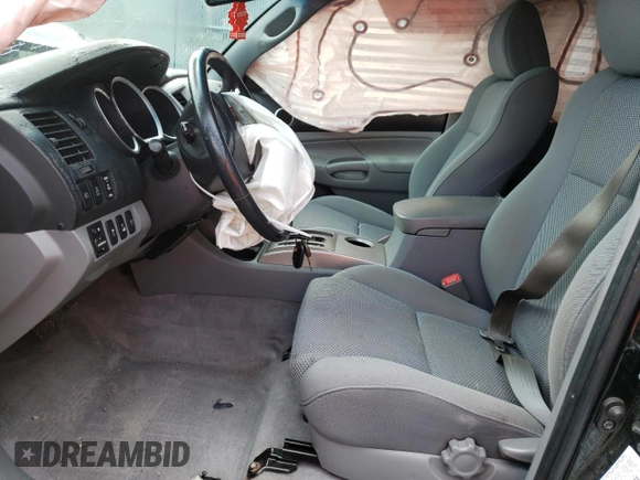 2009 Toyota Tacoma with VIN 5TEUU42N39Z660570, listed as a Copart auction lot 52025513 with 106,815 mi miles and Salvage title. Bid and sale history available at DreamBid. Image 7.