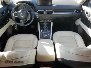 2021 Mazda CX-5 Grand Touring with VIN JM3KFBDM9M0490239, listed as a Copart auction lot 43306975 with 47,010 mi miles and Salvage Title. Bid and sale history available at carsss.com. Image 8.