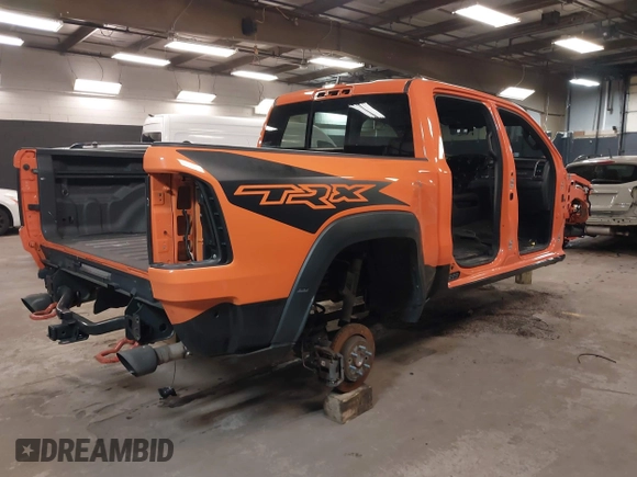 2022 Ram 1500 TRX with VIN 1C6SRFU9XNN149317, listed as a IAAI auction lot 41804066 with 42,856 mi miles. Bid and sale history available at carsss.com. Image 4.