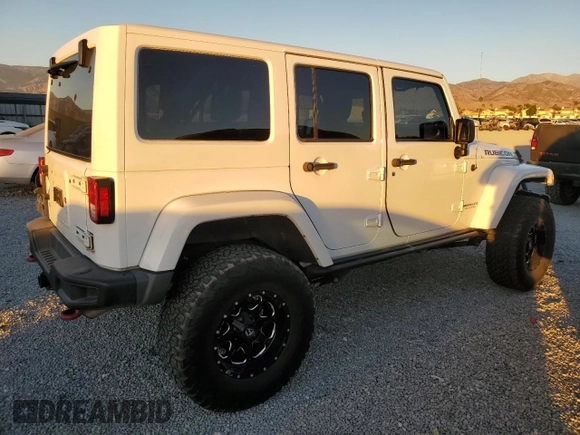 2015 Jeep Wrangler Unlimited Rubicon with VIN 1C4BJWFG5FL659017, listed as a Copart auction lot 84435034 with 69,915 mi miles and Salvage Title. Bid and sale history available at carsss.com. Image 3.