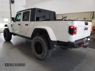 2020 Jeep Gladiator Rubicon with VIN 1C6JJTBG8LL121687, listed as a Copart auction lot 66404935 with 52,884 mi miles and Clean title. Bid and sale history available at DreamBid. Image 2.