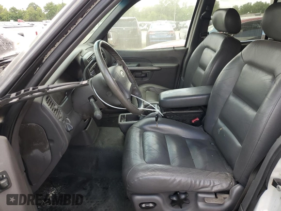 2002 Ford Explorer z VIN 1FMZU77F81UA77971, wystawiony jako Copart lot #58494644 z przebiegiem 156 594 mil mil oraz Szkoda całkowita • Salvage title. Historia ofert i sprzedaży dostępna na DreamBid. Obrazek 7.