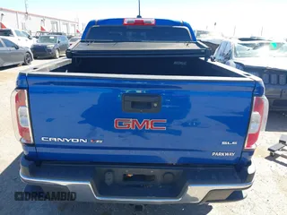 2019 GMC Canyon 4WD SLE z VIN 1GTG6CENXK1222416, wystawiony jako IAAI lot #41878077 z przebiegiem 85 415 mil mil oraz . Historia ofert i sprzedaży dostępna na DreamBid. Obrazek 17.