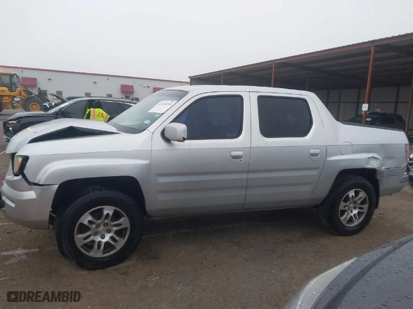 2006 Honda Ridgeline RTL with VIN 2HJYK16526H531190, listed as a IAAI auction lot 41450393 with 146,646 mi miles. Bid and sale history available at carsss.com. Image 14.