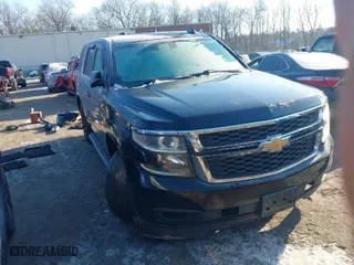 2016 Chevrolet Tahoe Commercial with VIN 1GNSKDEC9GR137688, listed as a IAAI auction lot 41387125 with 115,721 mi miles. Bid and sale history available at carsss.com. Image 1.