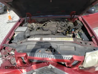 2002 Ford Explorer Sport Value z VIN 1FMYU60E52UB19739, wystawiony jako Copart lot #59337874 z przebiegiem 183 654 mil mil oraz Szkody całkowita. Historia ofert i sprzedaży dostępna na DreamBid. Obrazek 12.