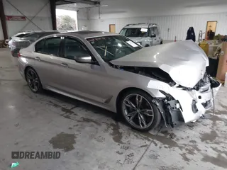 2020 BMW 5 Series M550i xDrive with VIN WBAJS7C07LCD85532, listed as a IAAI auction lot 41518071 with 57,645 mi miles and . Bid and sale history available at DreamBid. Image 1.