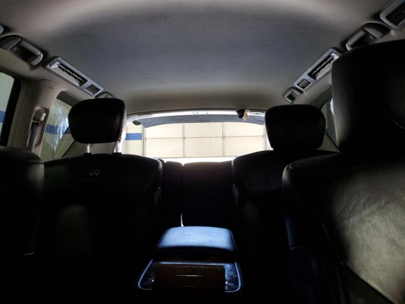 2011 Infiniti QX56 7-passenger with VIN JN8AZ2NE3B9005965, listed as a Copart auction lot 79526624 with 169,888 mi miles and Salvage Title. Bid and sale history available at carsss.com. Image 10.
