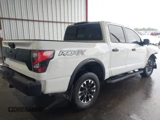 2021 Nissan Titan Pro-4X z VIN 1N6AA1ED7MN511004, wystawiony jako IAAI lot #42184599 z przebiegiem 36 086 mil mil oraz . Historia ofert i sprzedaży dostępna na DreamBid. Obrazek 4.