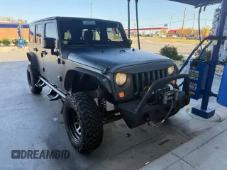 2015 Jeep Wrangler Unlimited Rubicon with VIN 1C4BJWFG3FL547025, listed as a Copart auction lot 53170835 with 103,707 mi miles and Clean Title. Bid and sale history available at carsss.com. Image 1.