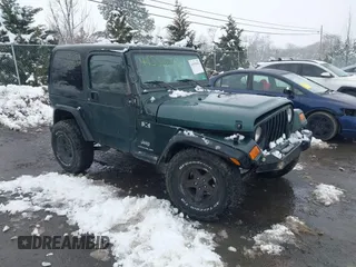 2003 Jeep Wrangler X with VIN 1J4FA39S13P310046, listed as a IAAI auction lot 41555652 with 177,503 mi miles. Bid and sale history available at carsss.com. Image 1.