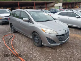 2013 Mazda 5 Sport with VIN JM1CW2BL5D0147824, listed as a IAAI auction lot 41822647 with 160,153 mi miles. Bid and sale history available at carsss.com. Image 1.