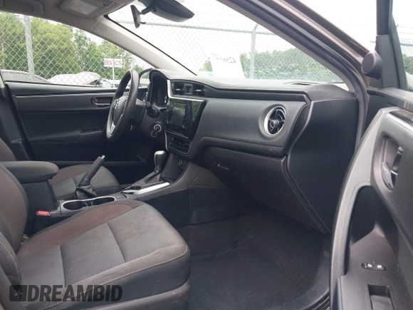 2018 Toyota Corolla L with VIN 2T1BURHE9JC990834, listed as a IAAI auction lot 42583027 with 217,143 mi miles and . Bid and sale history available at DreamBid. Image 5.