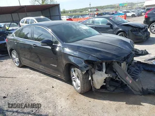 2016 Ford Fusion SE Hybrid z VIN 3FA6P0LU4GR204062, wystawiony jako IAAI lot #42041634 z przebiegiem 138 876 mil mil oraz . Historia ofert i sprzedaży dostępna na DreamBid. Obrazek 1.
