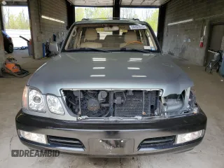 2001 Lexus LX 470 z VIN JTJHT00W113505721, wystawiony jako Copart lot #56463665 z przebiegiem 223 553 mil mil oraz Szkody całkowita. Historia ofert i sprzedaży dostępna na DreamBid. Obrazek 5.