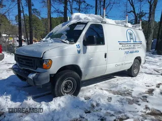 2007 Ford Econoline Cargo Commercial with VIN 1FTNE14WX7DB23318, listed as a IAAI auction lot 41560386 with 209,790 mi miles and . Bid and sale history available at DreamBid. Image 2.