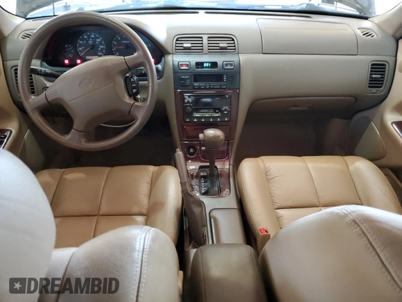 1999 Nissan Maxima GXE z VIN JN1CA21D0XT808755, wystawiony jako Copart lot #49693685 z przebiegiem 63 389 mil mil oraz Szkoda całkowita • Salvage title. Historia ofert i sprzedaży dostępna na DreamBid. Obrazek 8.